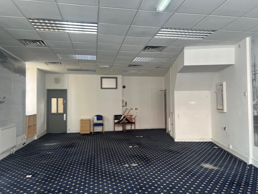 Lot: 127 - FREEHOLD FOUR STOREY COMMERCIAL BUILDING IN PROMINENT TRADING LOCATION - Ground floor office off Fore Street